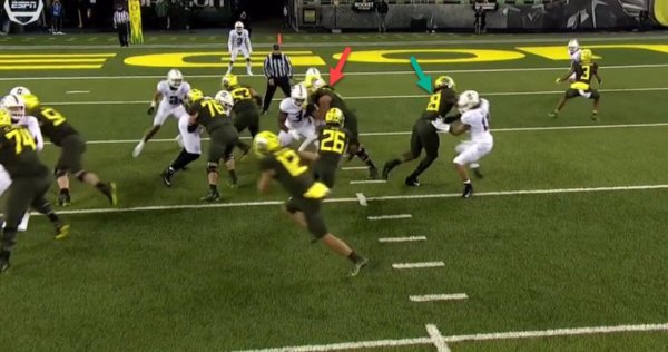 No. 71 Malaesala Aumavae-Laulu Red arrow and No. 89 DJ Johnson Green arrow_ESPN Video.jpg