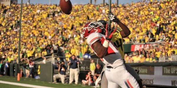Ifo Ekpre-Olomu stops a TD_KC_FP.jpg
