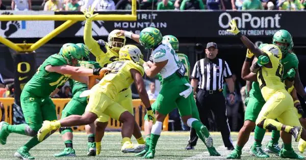 Ty Thompson with pass rush_Gary Breedlove.jpg
