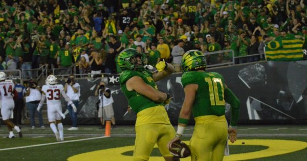 Terrance Ferguson and Bo Nix after his 80 yard TD by JT.jpg