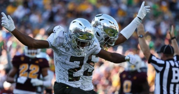 Bryant and Holden Celebration_Eric Evans of Oregon Football.jpg