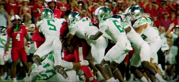 Ducks stop Shough on 4th down_Screenshot from GoDucks.com Video.jpg
