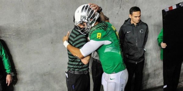 Mariota and Helfrich Hug_KC_FP.jpg