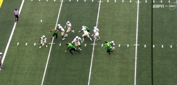 Freshman Edge Rushers No. 44 and No. 17 closing in_Screenshot from ESPN Video.jpg