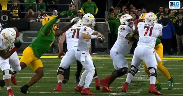 Fumble about to happen, from Jordan Burch_Screenshot from B1G Sports Video.jpg